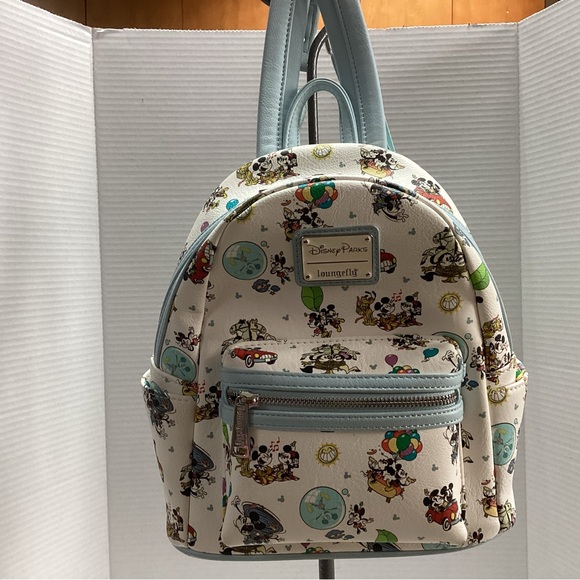 Loungefly Handbags - Loungefly Disney Mini Backpack. Minnie’s Runaway Railway